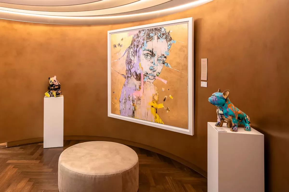 Fine art gallery aboard Explora Journeys ship featuring contemporary paintings and classic masterpieces by renowned artists.