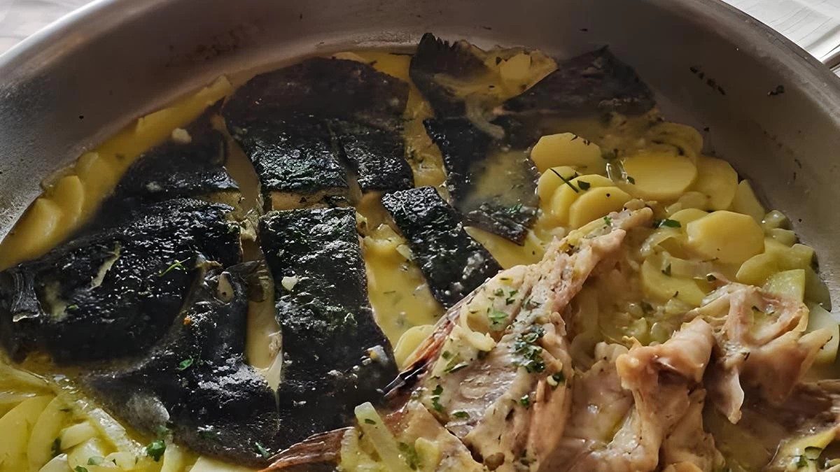 Traditional Croatian food Gregada, classic Dalmatian fish stew with potatoes, olive oil, and herbs from Hvar Island