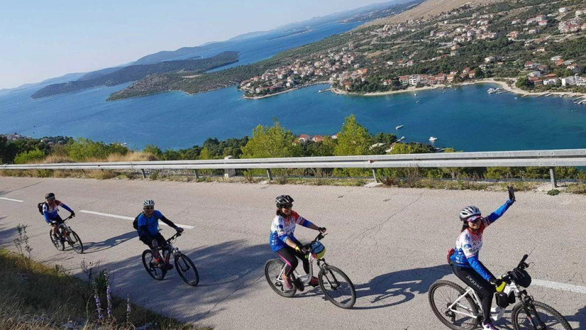 Cyclist riding along coastal trails in Grebaštica near Šibenik, Croatia