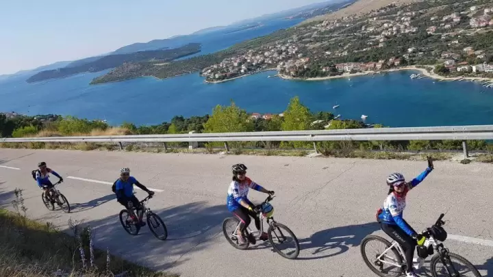 Cyclist riding along coastal trails in Grebaštica near Šibenik, Croatia