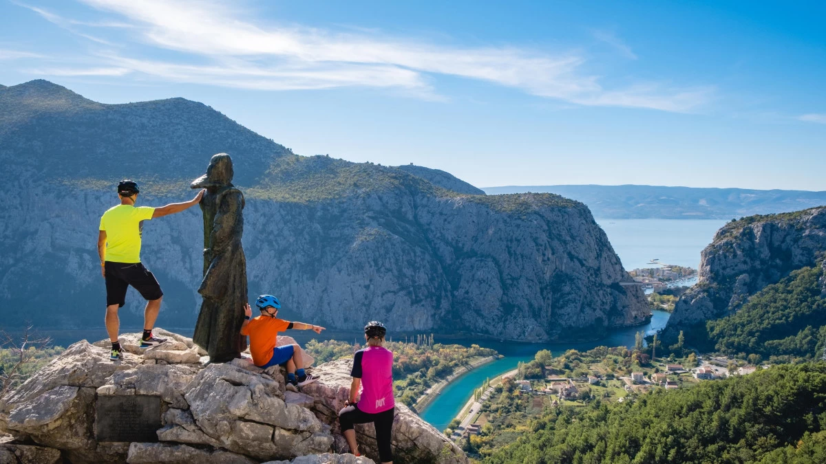 Cyclist exploring Omiš in Central Dalmatia, Croatia, riding through the Cetina River canyon and coastal mountain trails with Adriatic views – Cycling Croatia