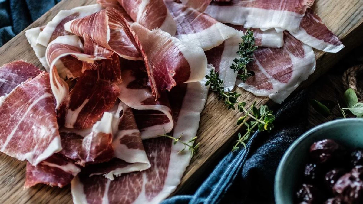 Traditional Croatian food pršut, dry-cured ham aged in sea air and bora wind, a prized delicacy of Dalmatian cuisine