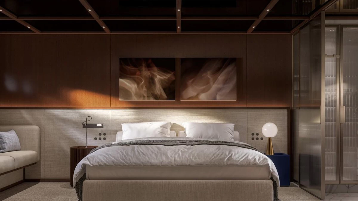 Master cabin of Sanlorenzo SHE yacht featuring warm tones, refined mahogany details, and minimalist Italian mid-century style.